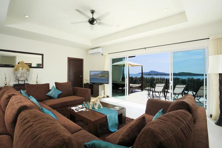 Second living room, on the upper level, leading onto balcony with stunning sea views